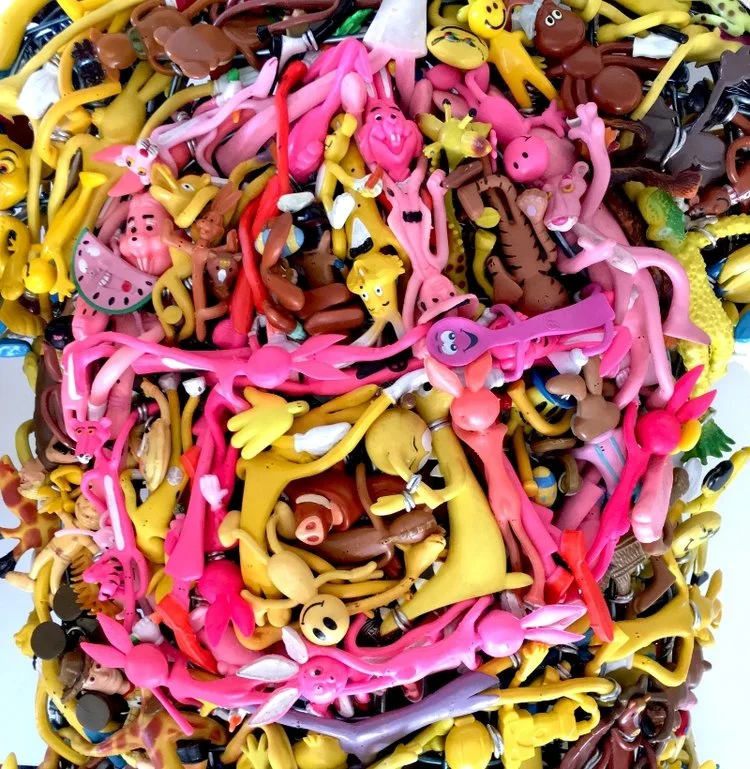 Over the past decade, artist Michael Decker has collected thousands of bendable figurines commonly known as bendies, produced for their malleable play. Although they rarely vary in their construction of pliable wire covered in rubber, the figures ra…