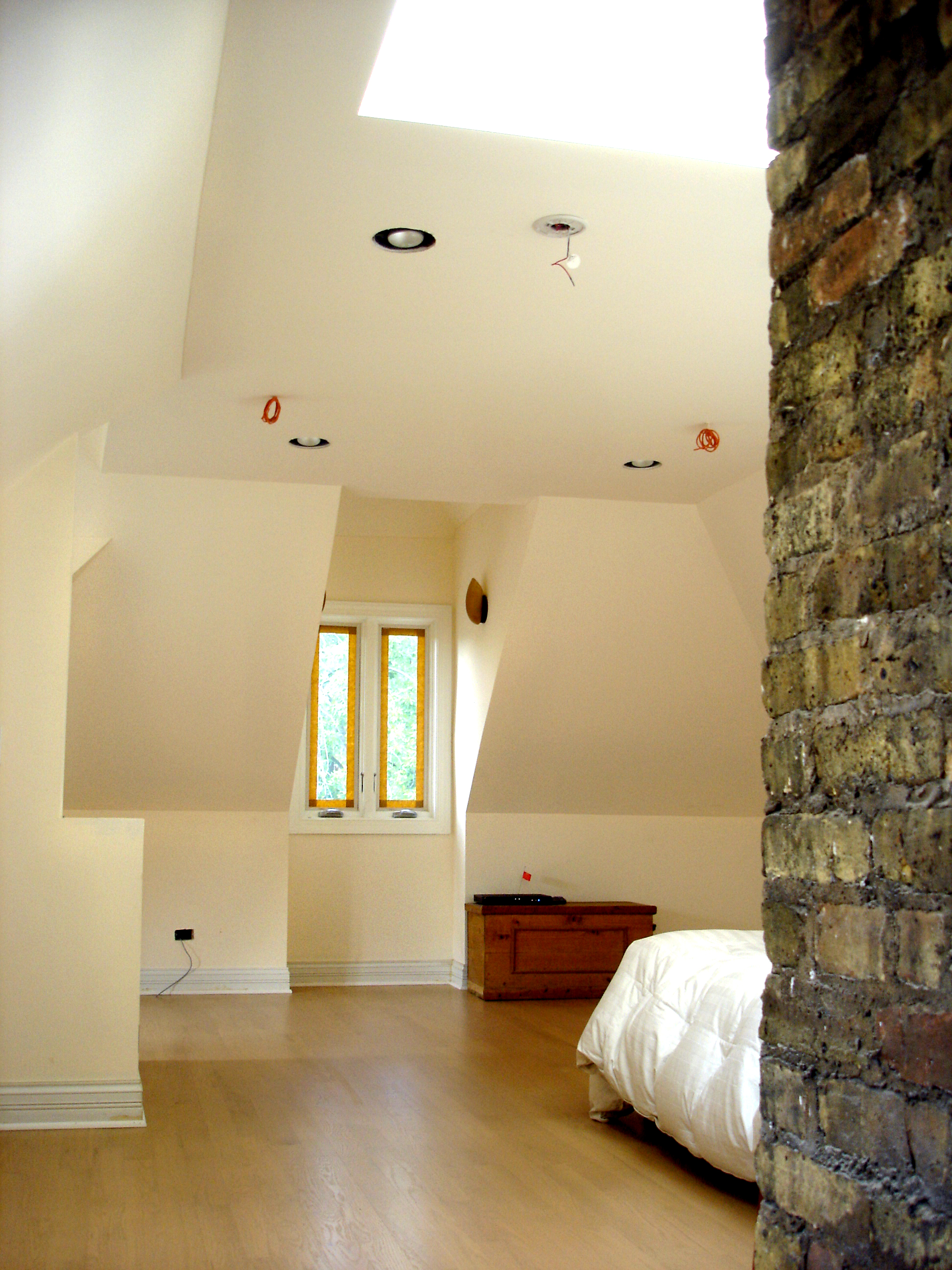 custom single-family residential home renovation, 1920s four-bedoom house, attic bedroom suite, skylight