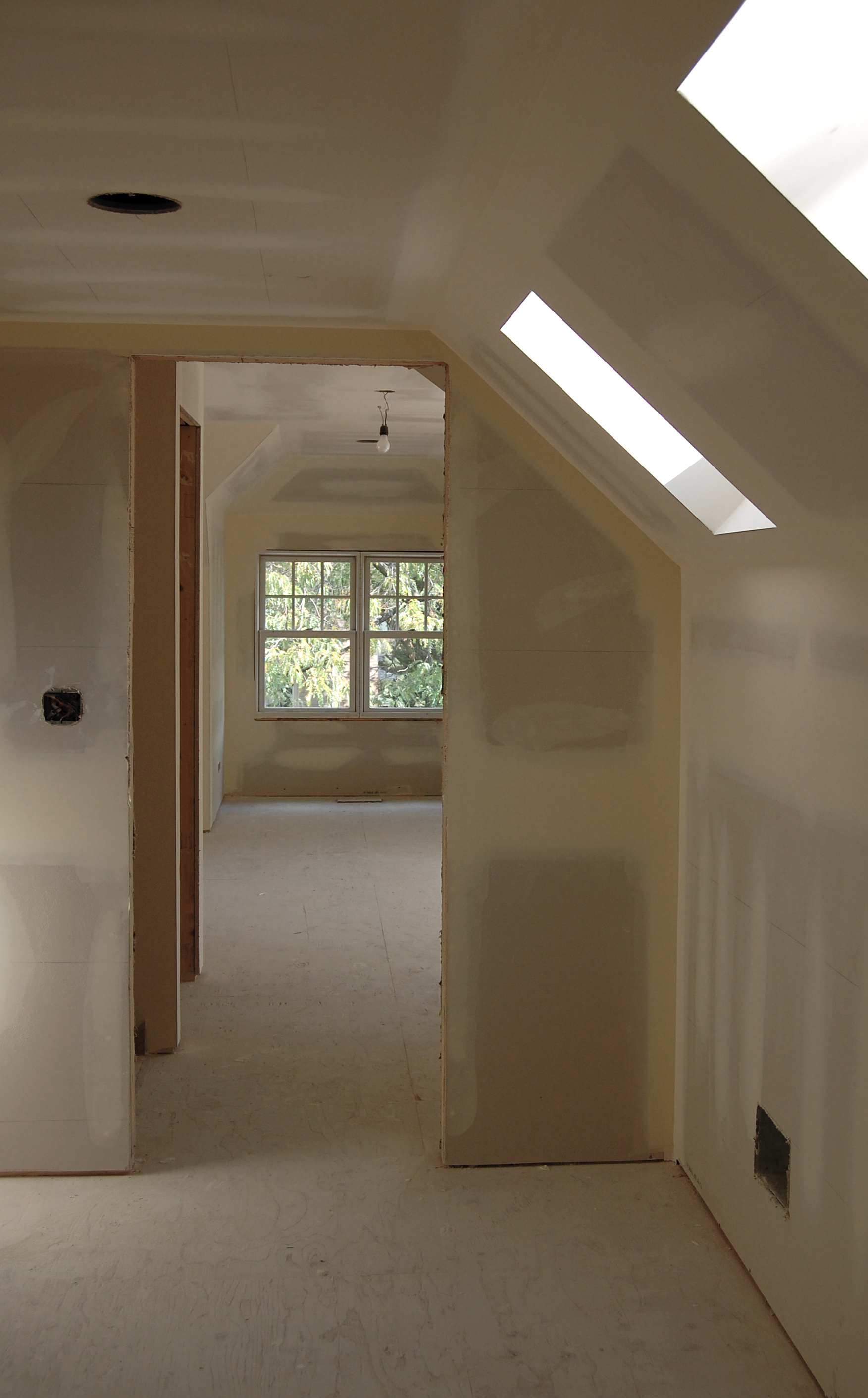 gut renovation frame house residential, modernized electrical heating systems, weatherize building envelope, energy efficient, interior windows, under construction, attic bedroom suite