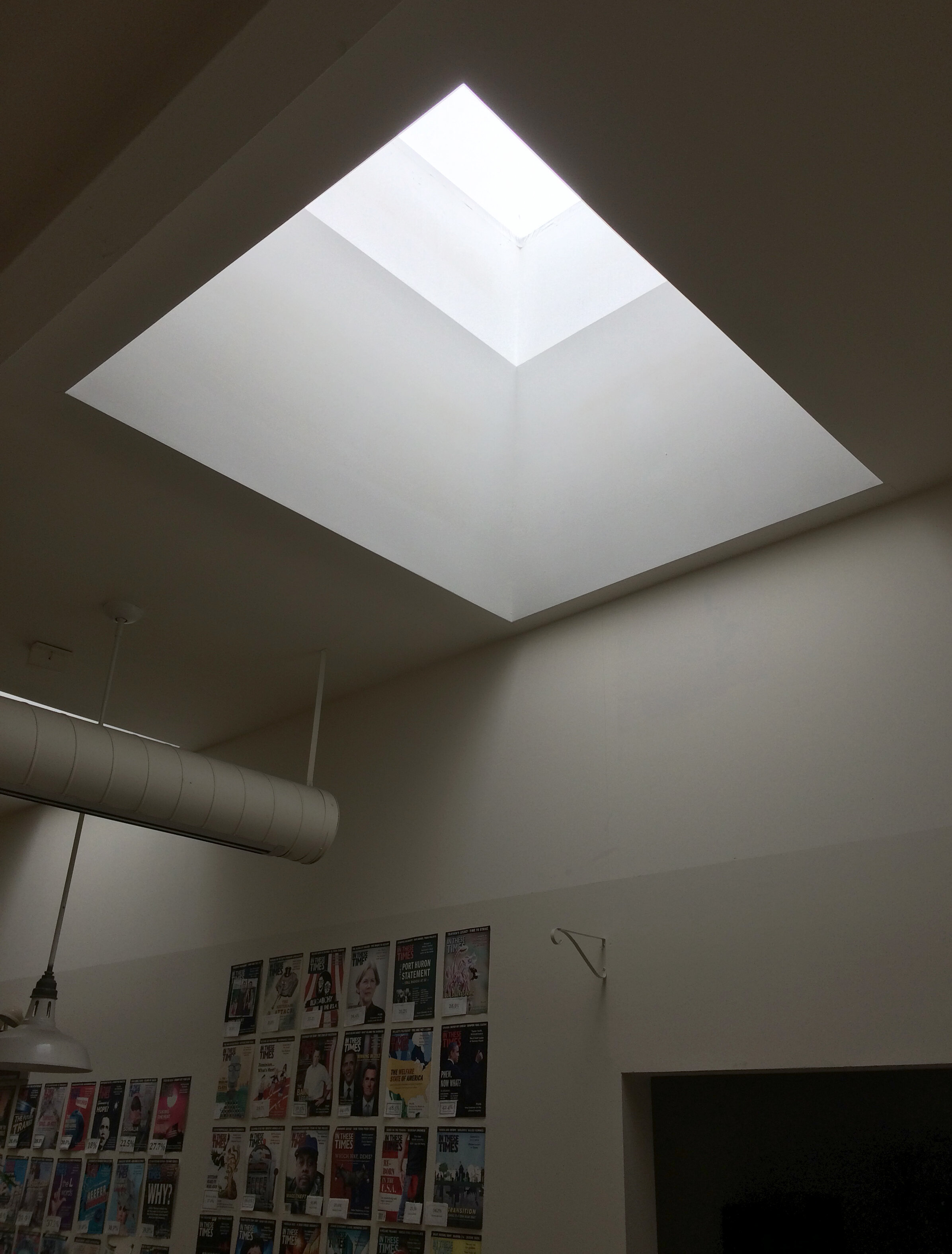 Milwaukee Avenue commercial storefront office interior, renovated, new skylight