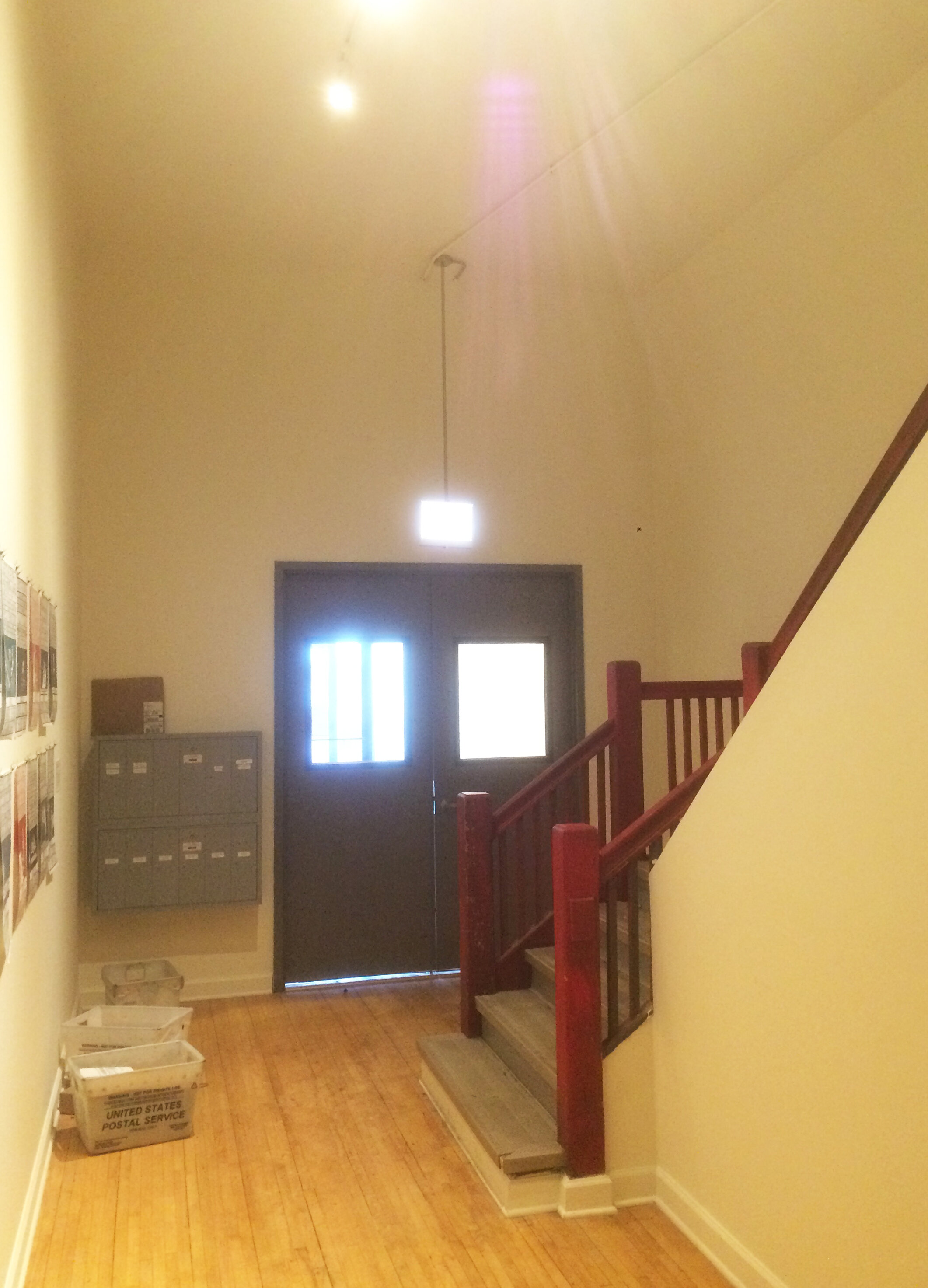 Milwaukee Avenue commercial storefront interior, renovated entryway lobby stairs