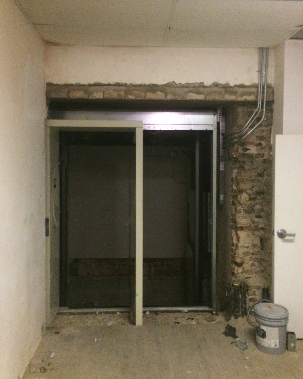 Elevator shaft renovation &amp; passenger elevator installation in progress