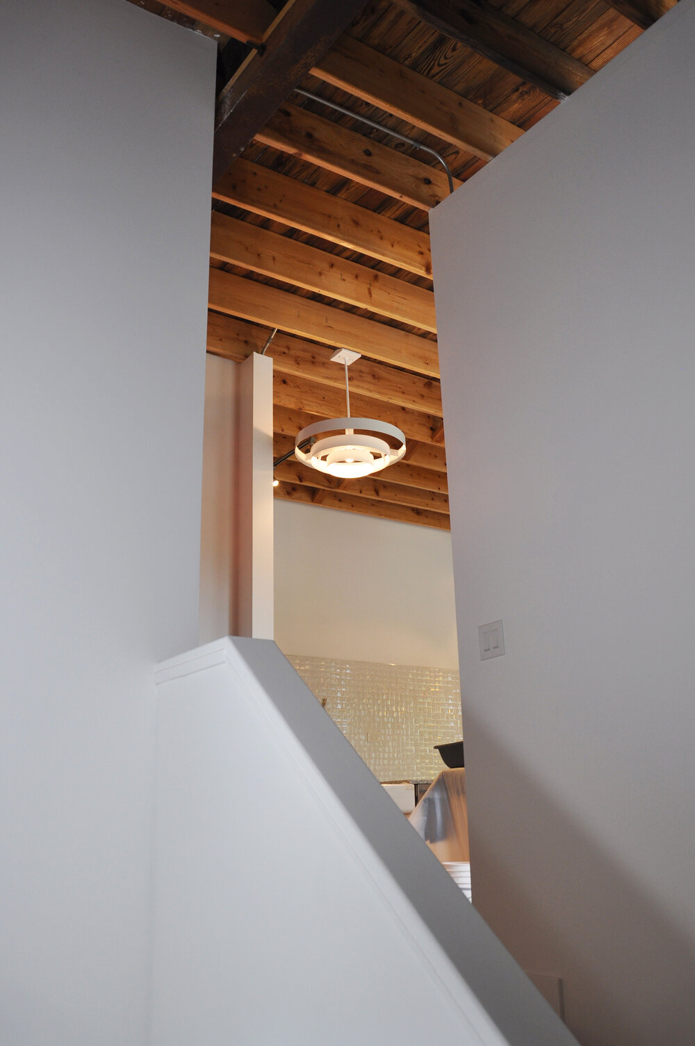 Kitchen light fixture viewed from back stairs