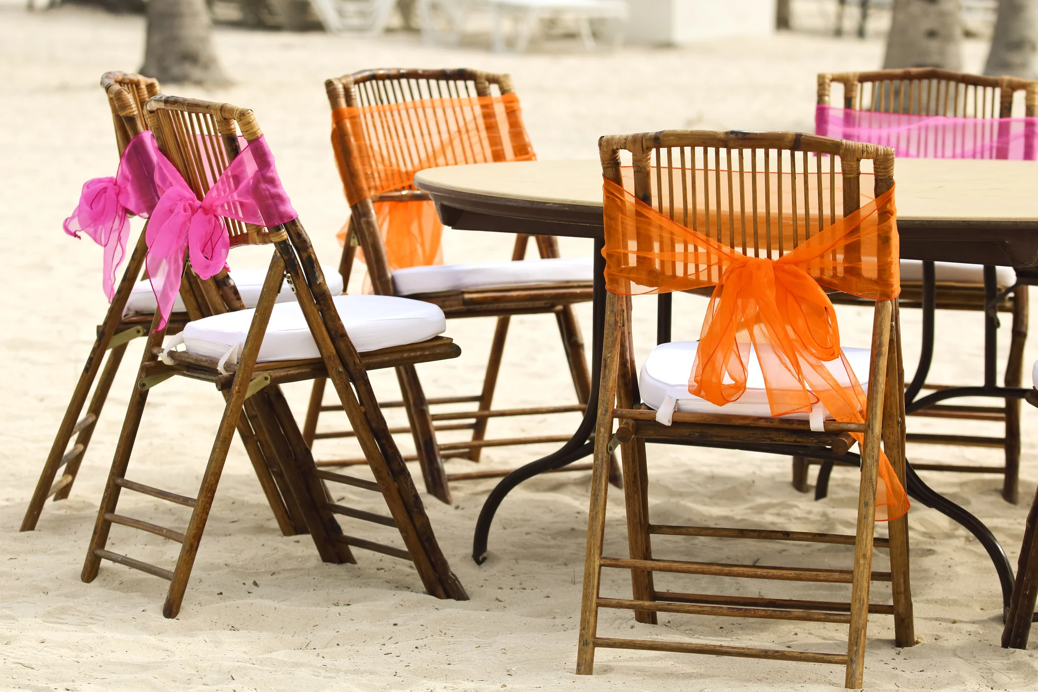 Wedding-Chairs-on-the-Beach-with-colorful-chiffon-ribbons-attached-544672906_2125x1416.jpeg