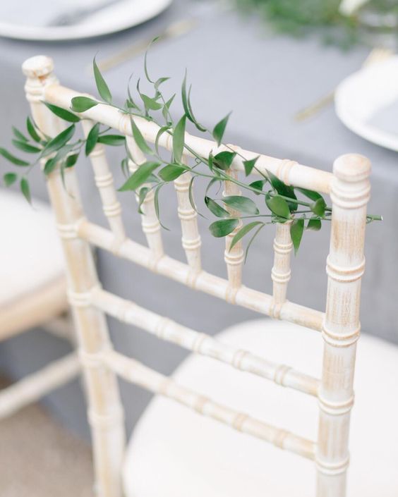 white chiavari chairs with ivy.jpg