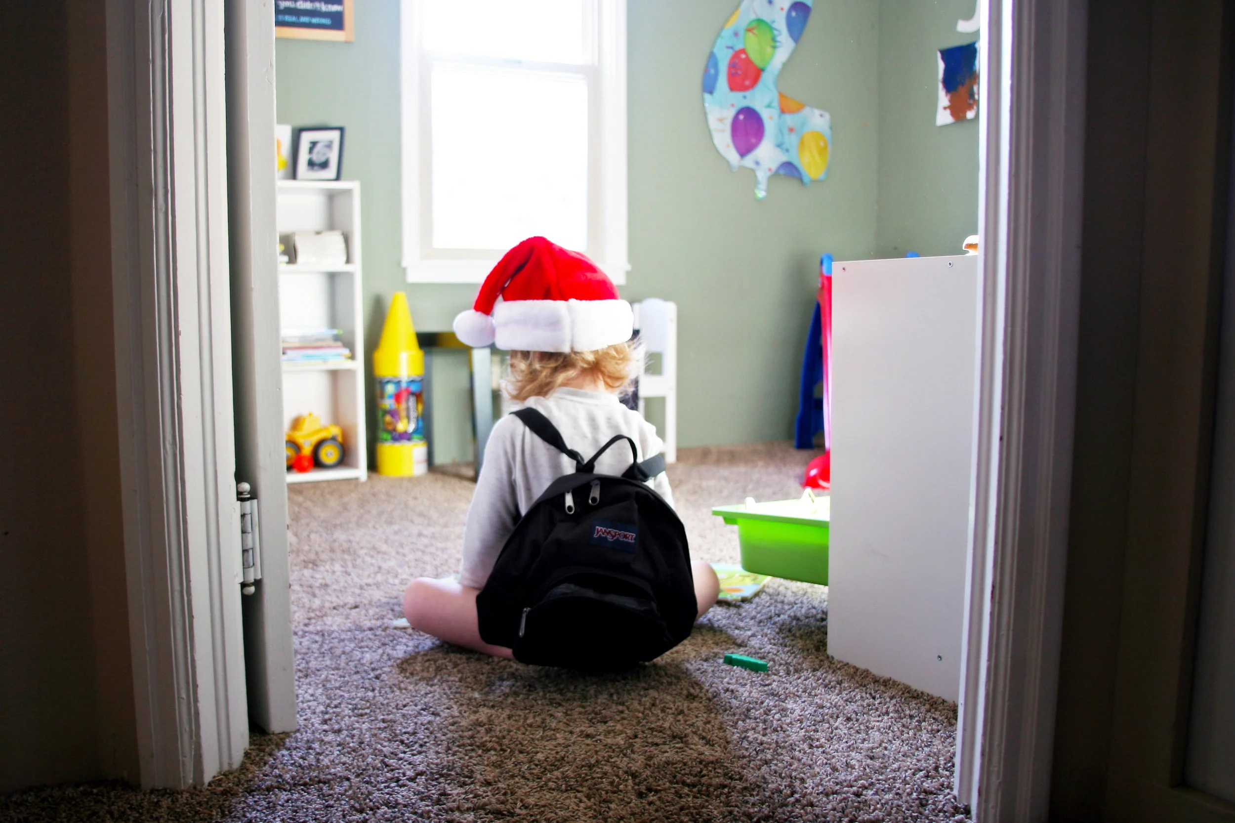 Jonas taking a break during all the holiday cookie chaos.