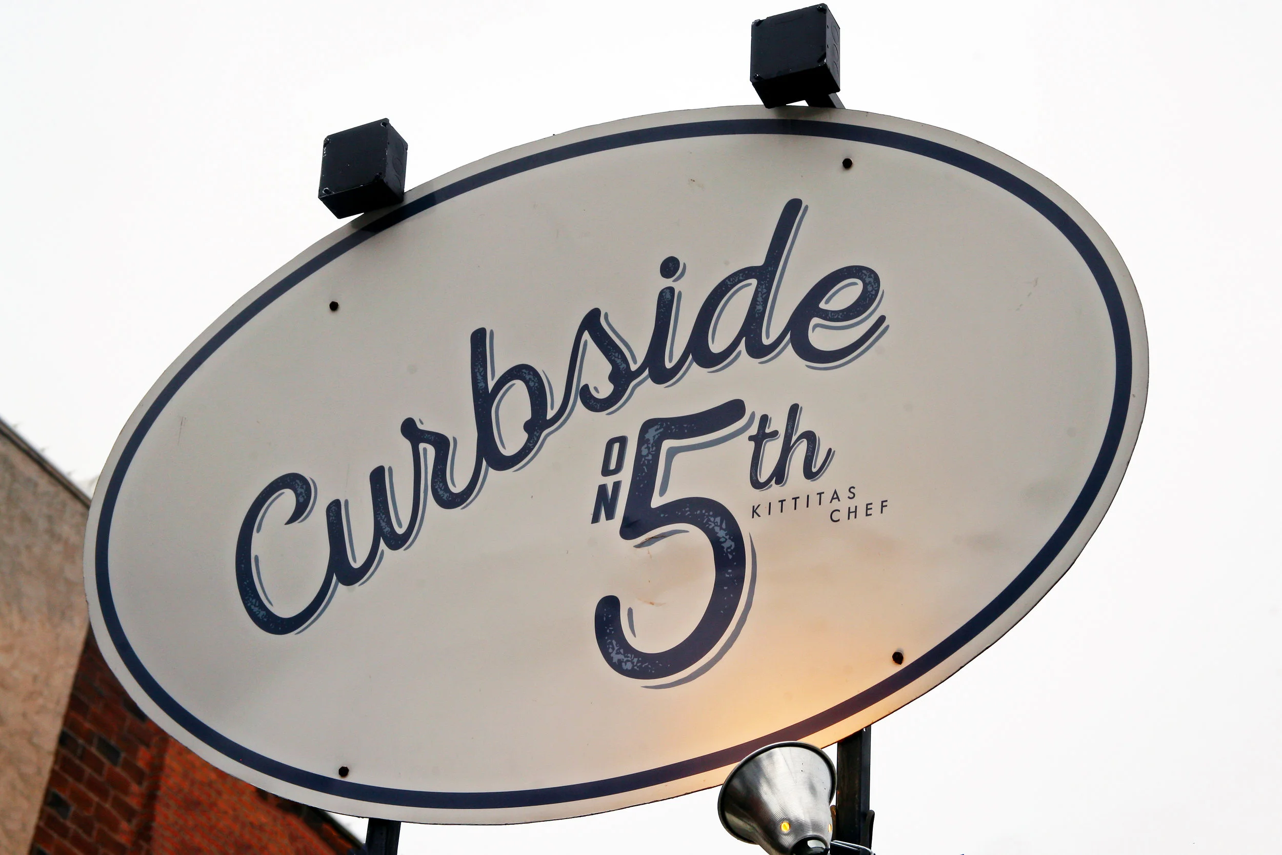 Curbside Sign.jpg