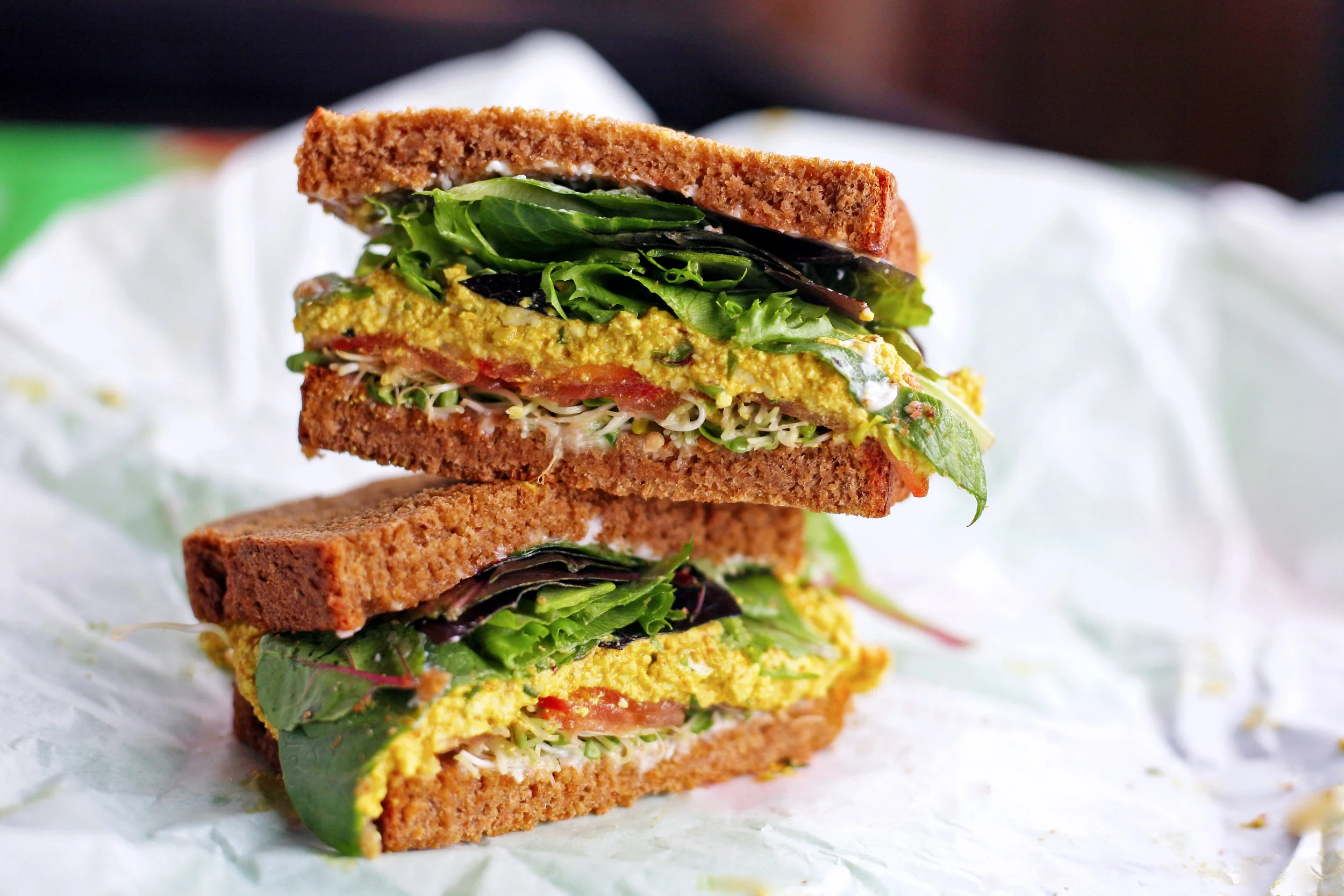 One of Lunchbox Cafe's new menu features, Organic Curry Tofu Salad Sandwich