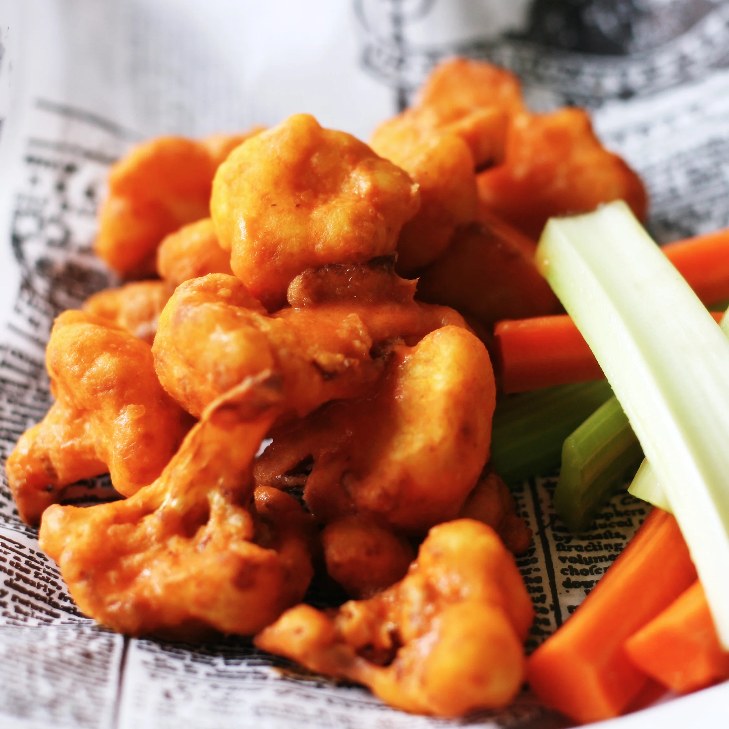Fried Cauliflower Bites are vegan when ordered buffalo style and without dipping sauce