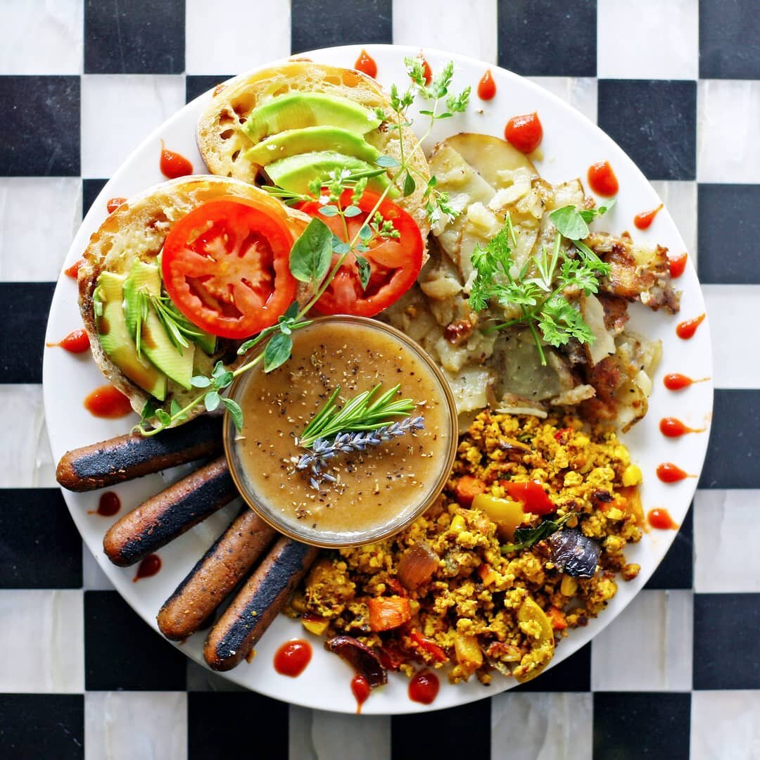 Sometimes being a vegan mom means throwing together an epic brunch. Fried potatoes with coconut milk and parsley, lavender black pepper gravy, tofu scramble curried with five spice, field roast sausage, and toast on @vinmans_bakery bread with avocado