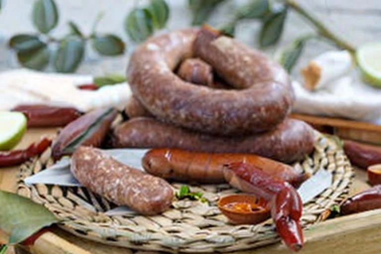 Sobrasada or sobrassada traditional mallorcan cured sausage with pepper paprika and other spices.jpg