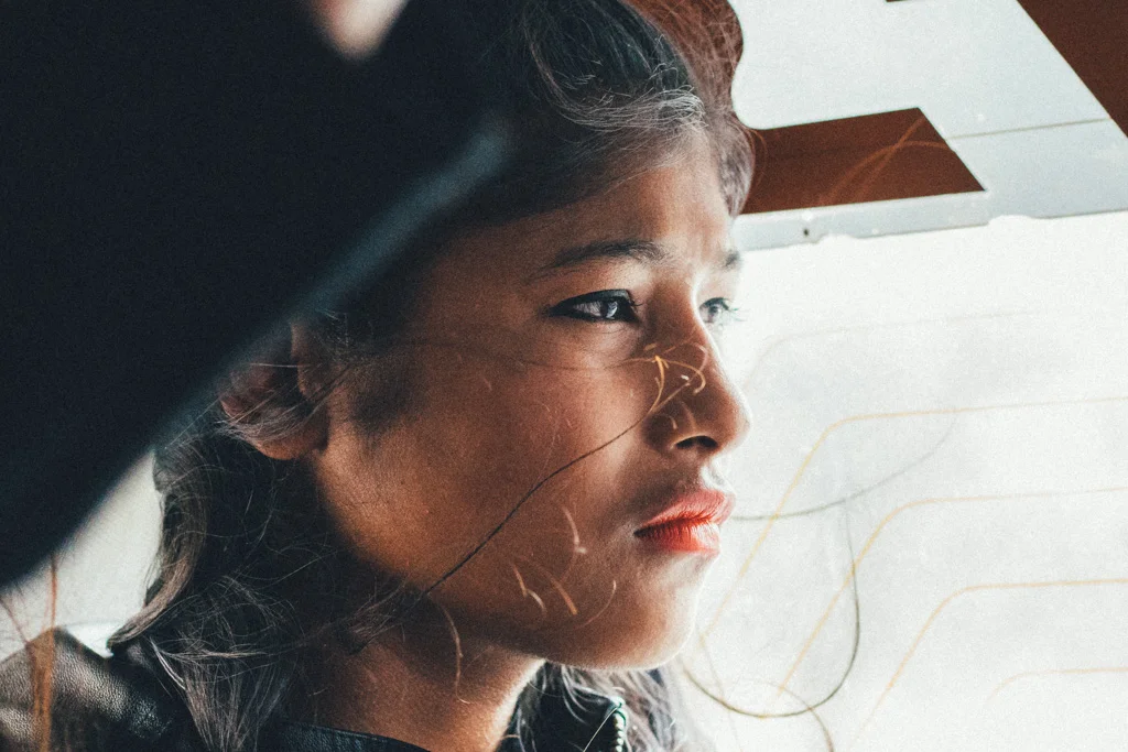 A Nepali woman riding a local bus - 30 photos that will make you want to visit Nepal