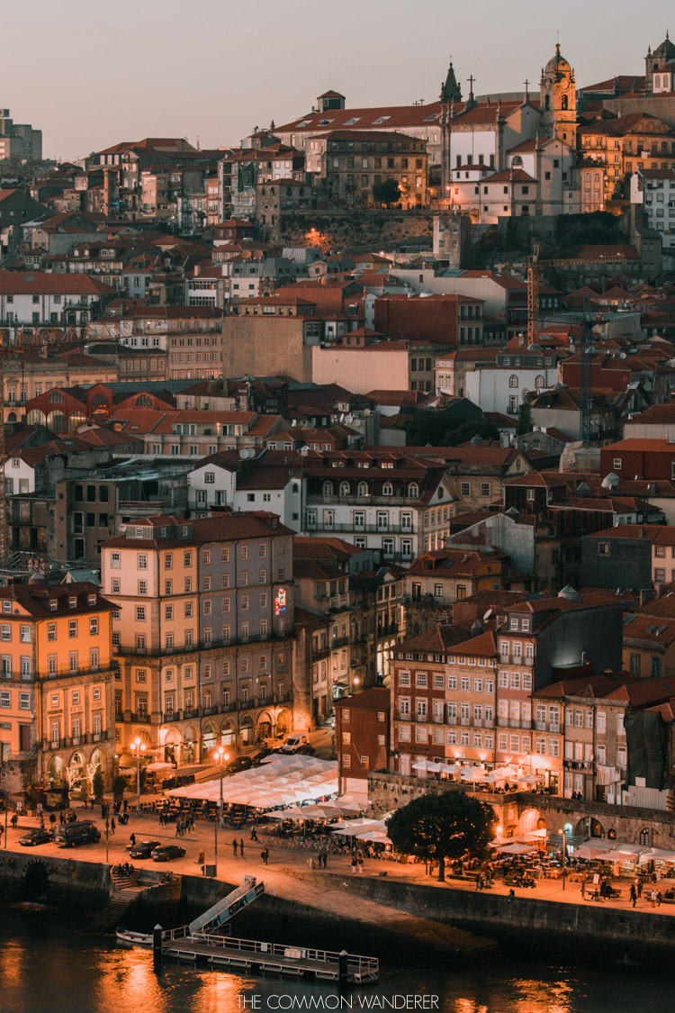 The ribeira district of porto and the Douro lit up at twilight