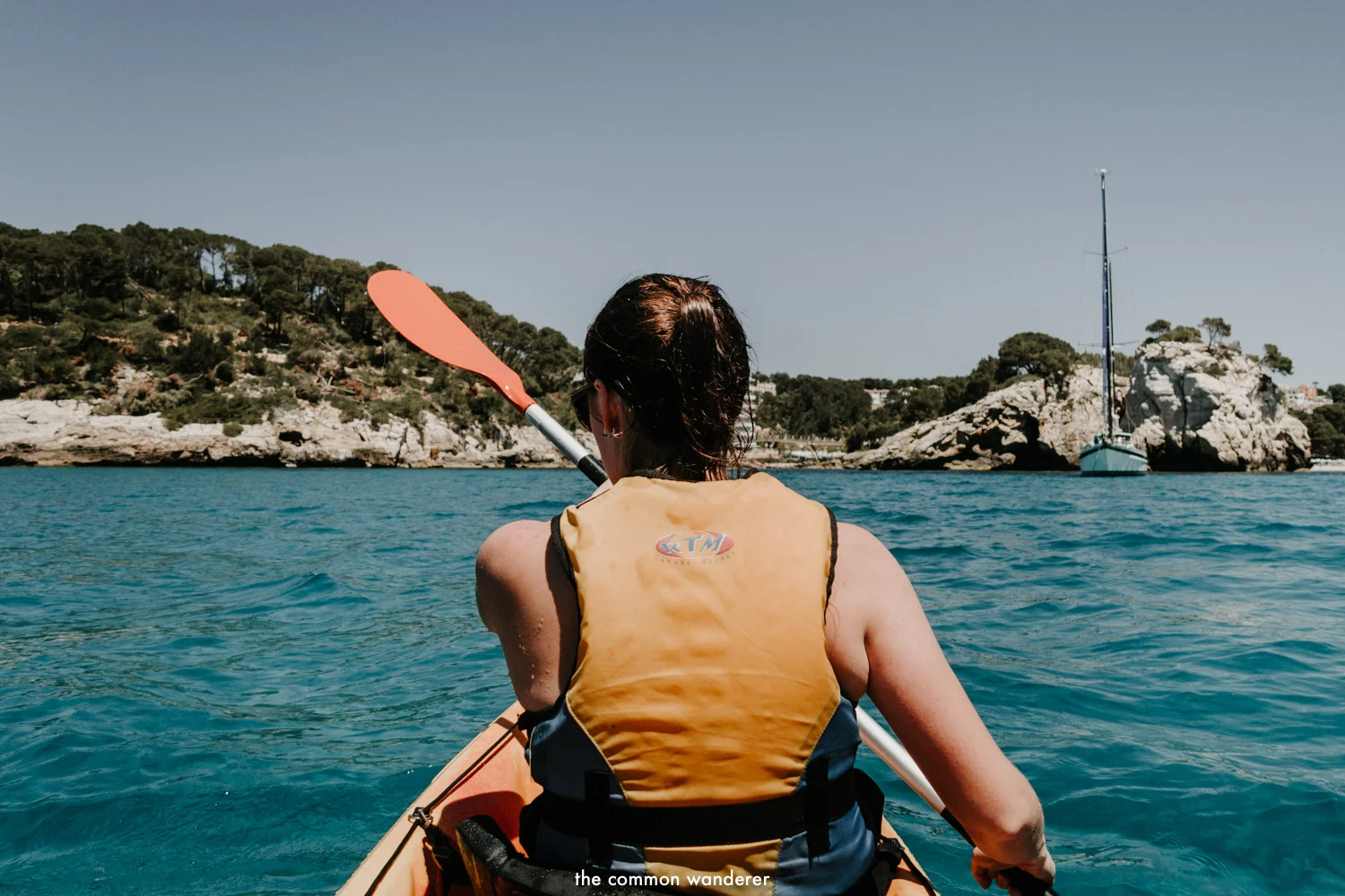 Kayaking through the turquoise waters of Menorca, Spain