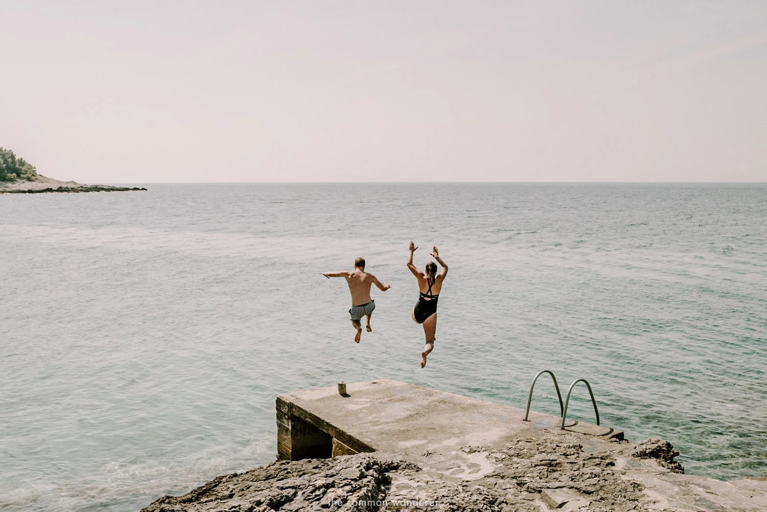 Jumping into the clear waters in Hvar, Croatia