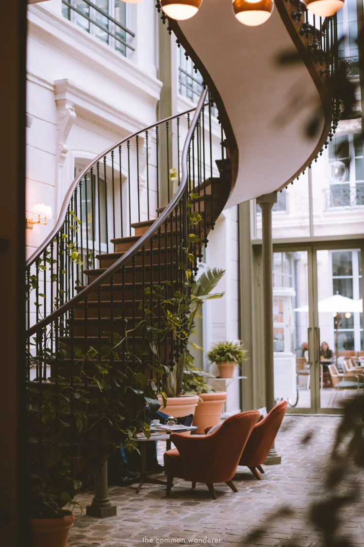 The glass, steel, and plush entrance foyer of the hotel - THECOMMONWANDERER.COM