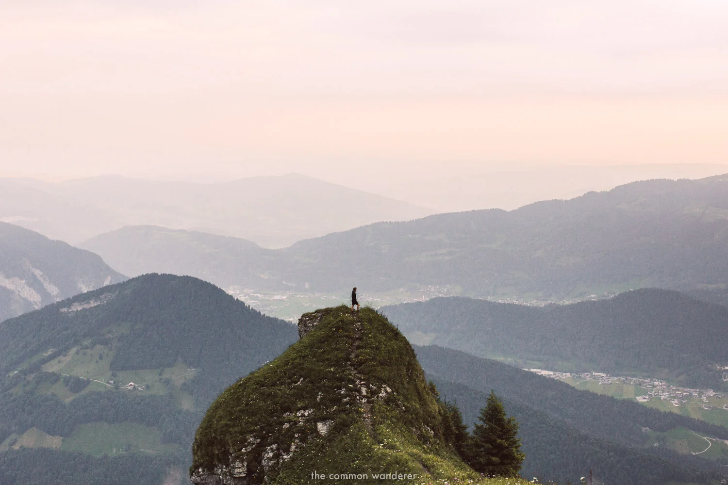 a man standing overlooking Mellau, Vorarlberg