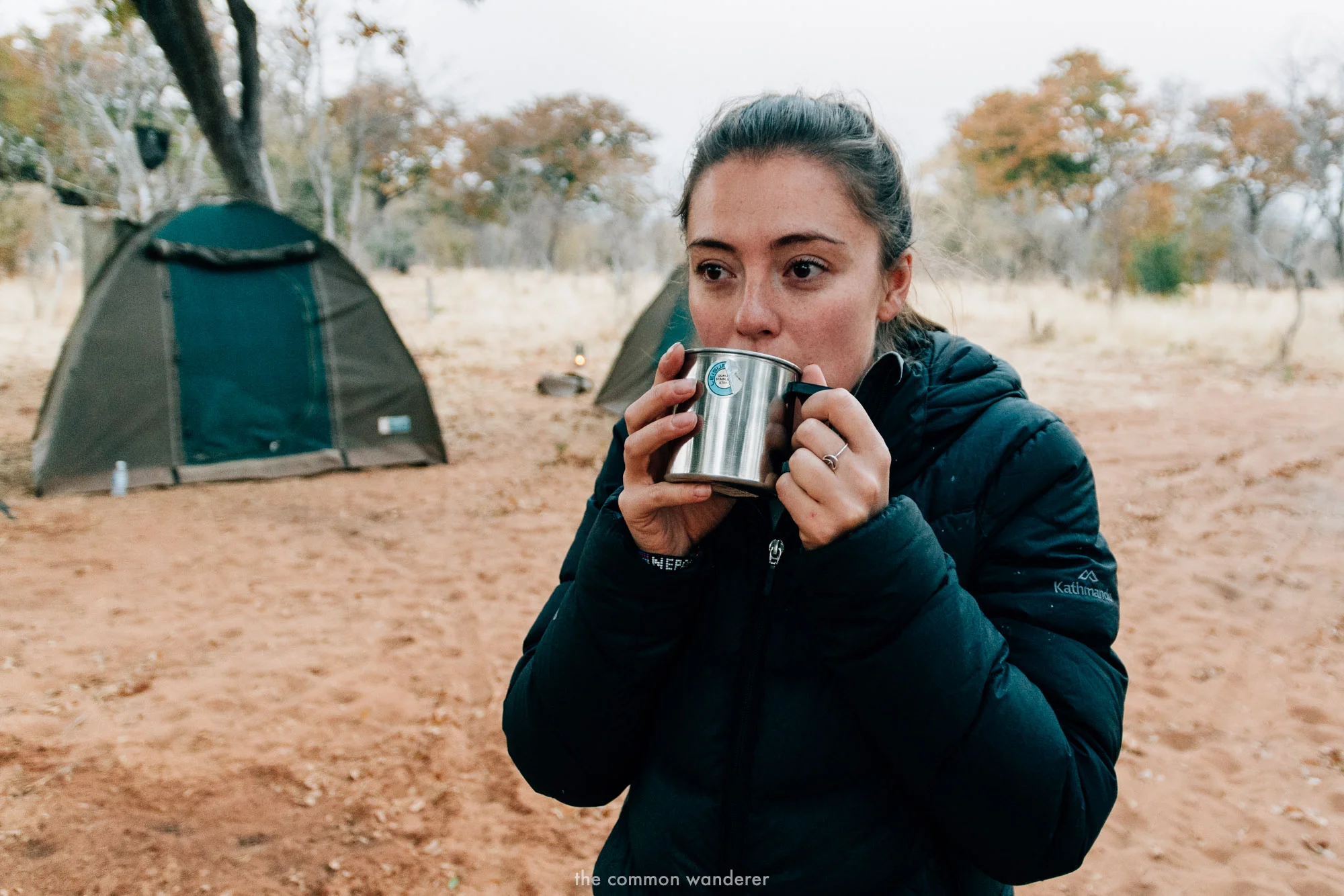 a woman drinking tea in Chobe National Park
