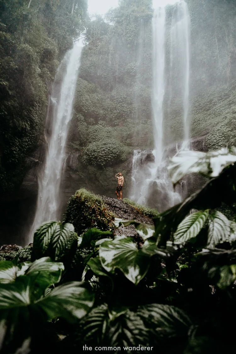 A guide to Sekumpul waterfall, Bali | standing under the waterfall