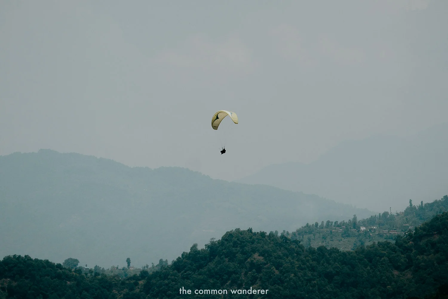 Floating above Pokhara while paragliding - one of the best things to do in Pokhara