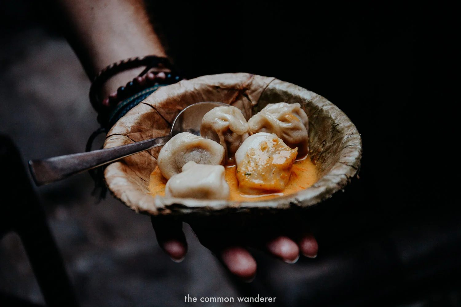 A woman cooking a curry in Nepal