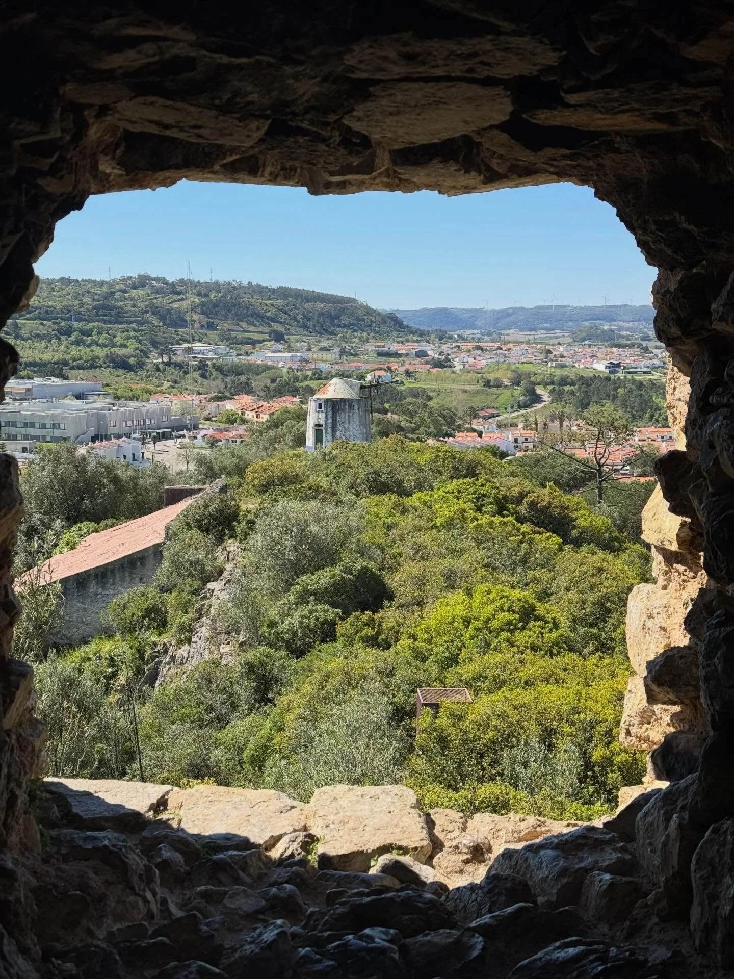 From Lisbon we hired a local driver to take us on a day-trip to Obidos and Nazare. 

In Obidos we spent a couple of hours walking along the city walls and wandering the small charming streets. We even enjoyed a taste of Ginjinha, a sour cherry liquor