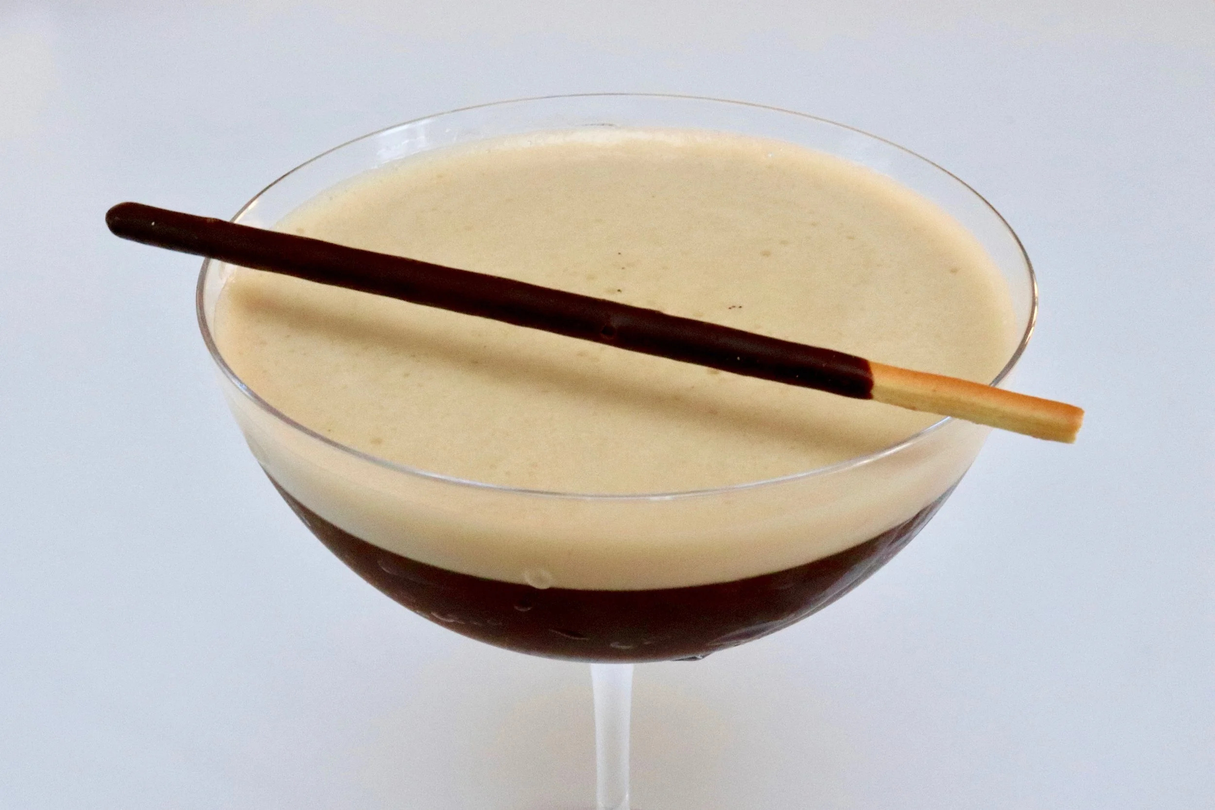 Classic espresso martini with a simple Mikado chocolate garnish