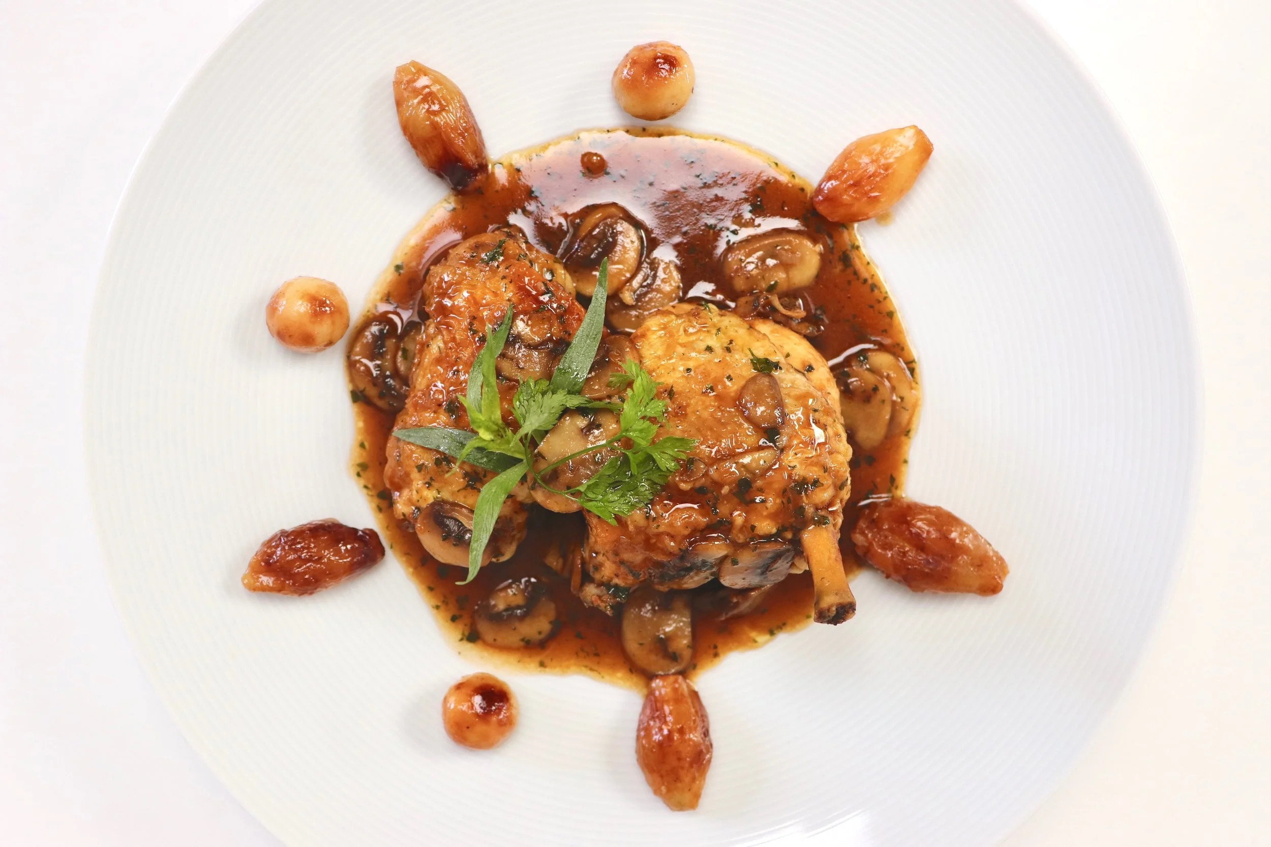 Pan-fried chicken in mushroom, chervil and tarragon sauce