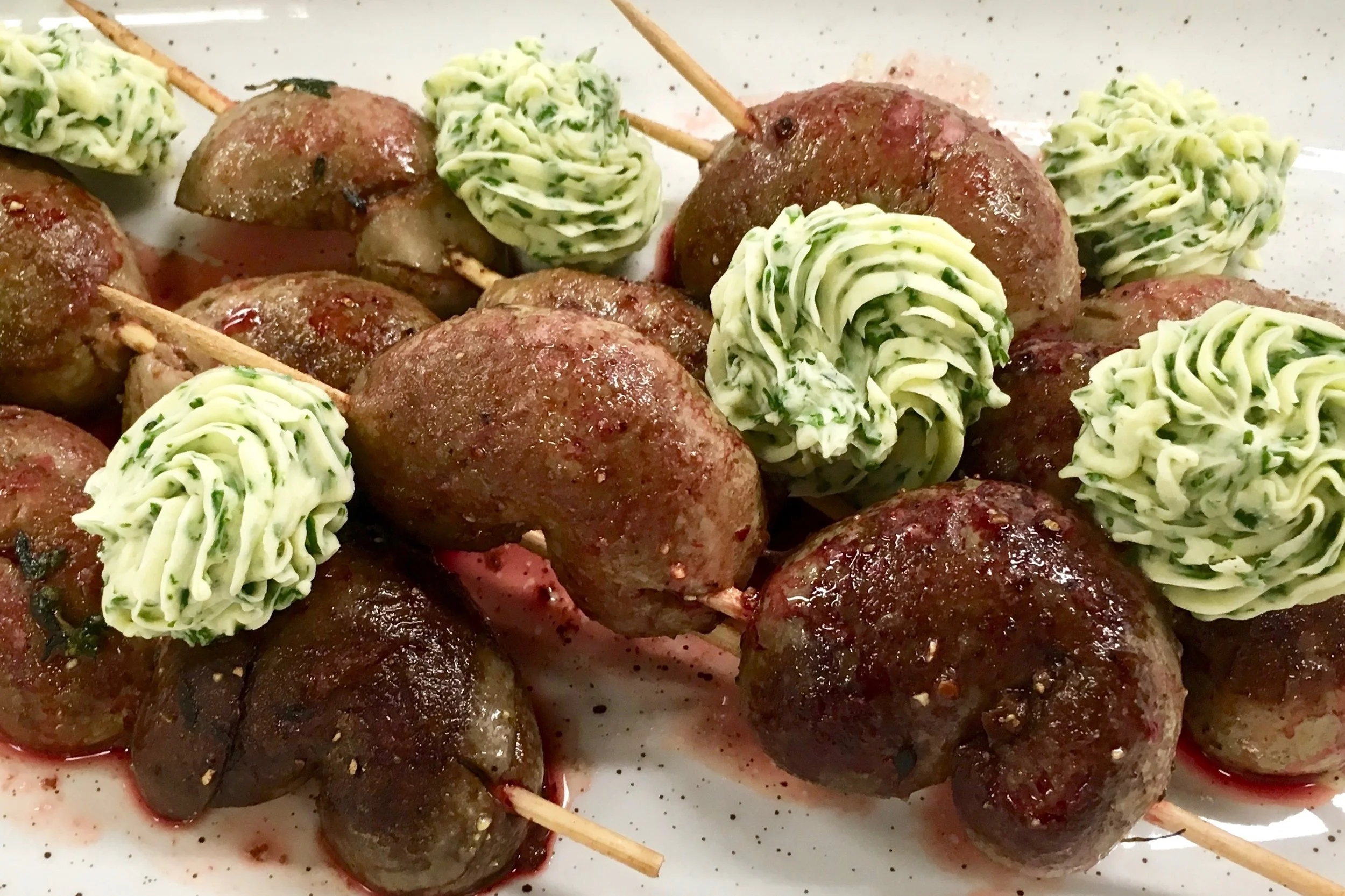 `Fried lamb kidneys with compound butter