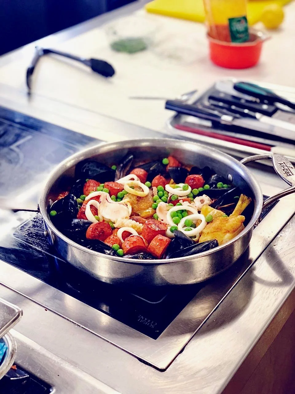 Paella with chicken legs, baby chorizo, prawns, mussels, squid and Bomba rice