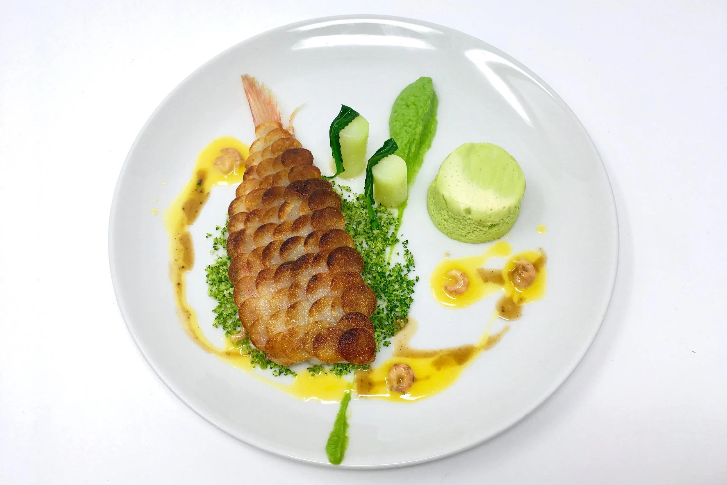 Chef’s red mullet with crispy potato scales and an assortment of broccoli garniture
