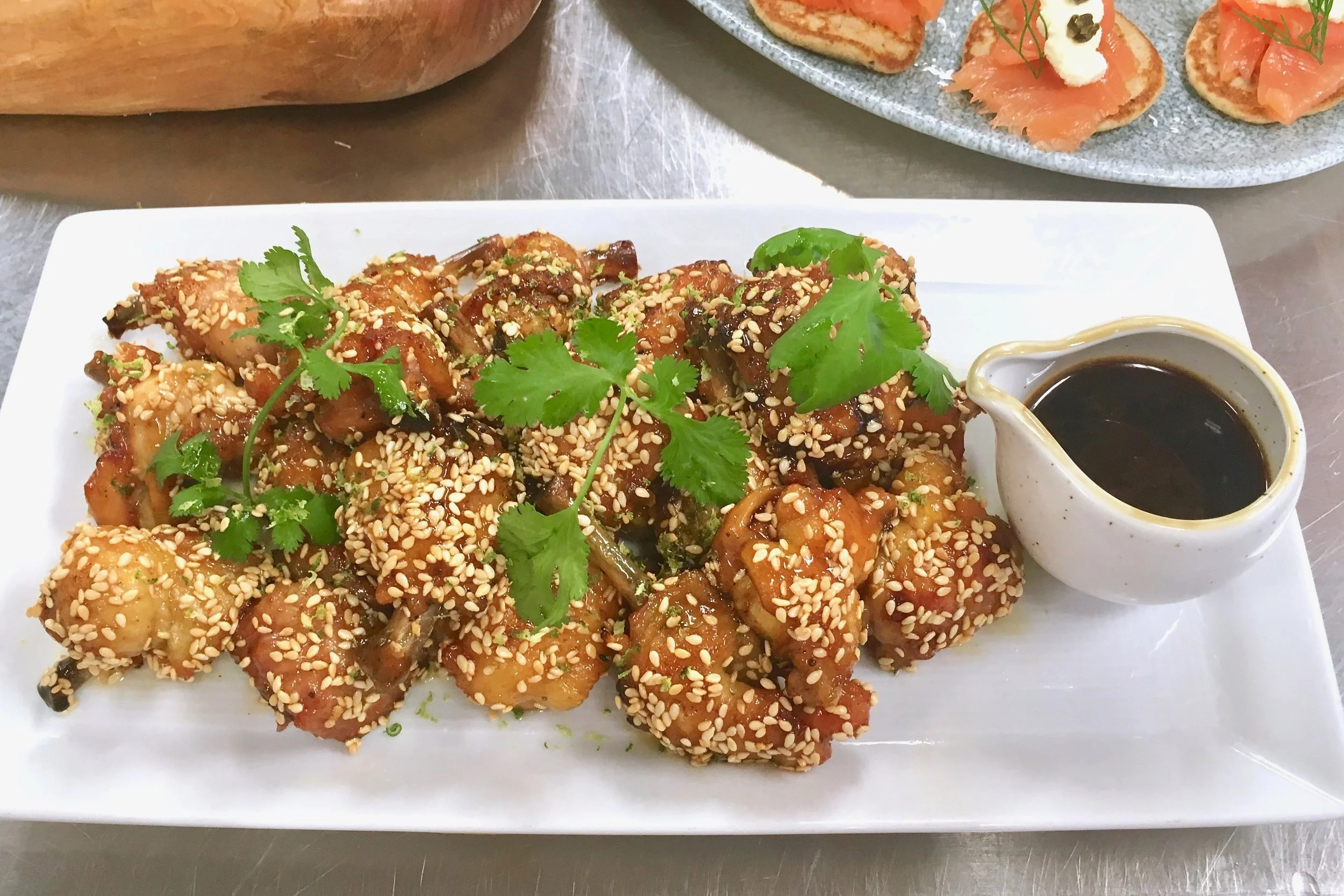 Smoked chicken wing lollipops with a lime and honey glaze