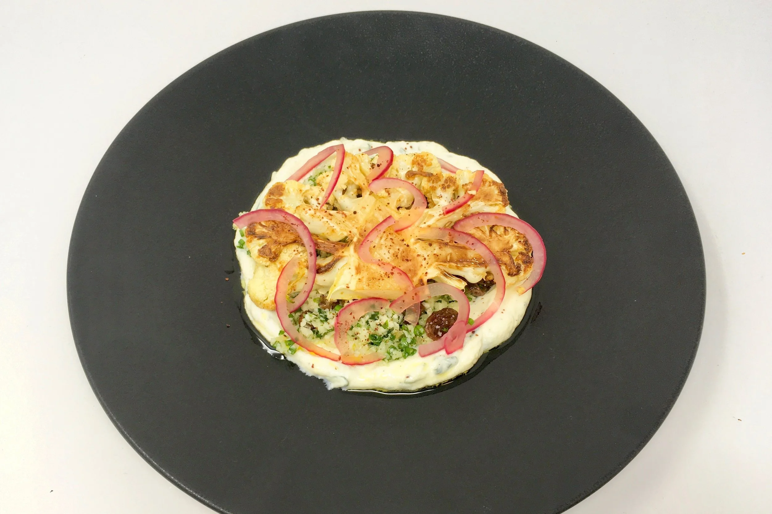 Chef’s cauliflower steak with cauliflower couscous