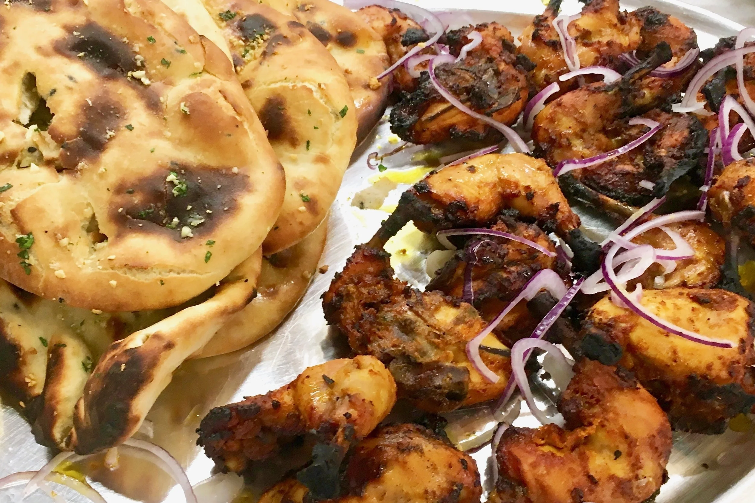Tandoori chicken with naan bread