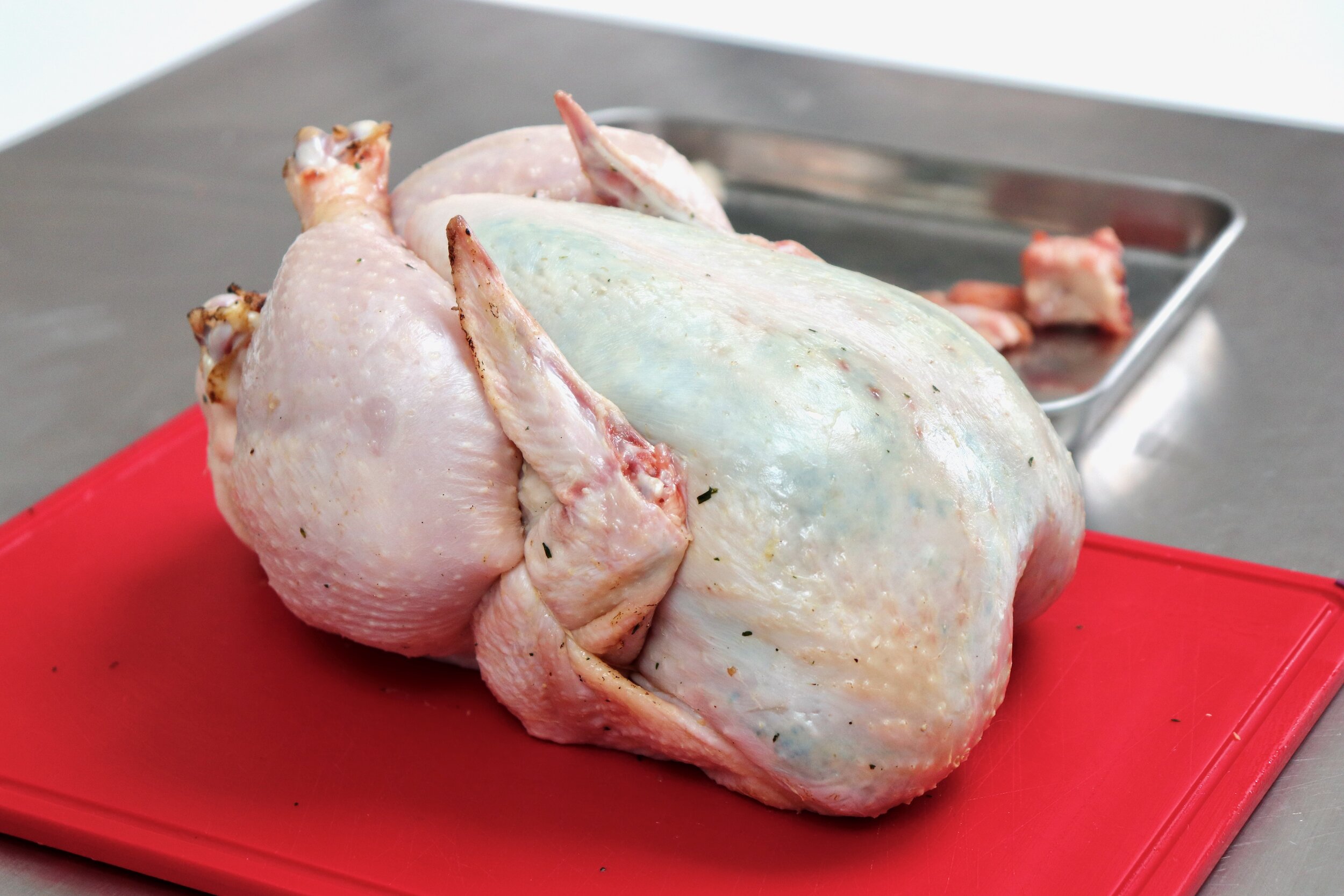 Stuffed, trussed and compound butter under the breast skin