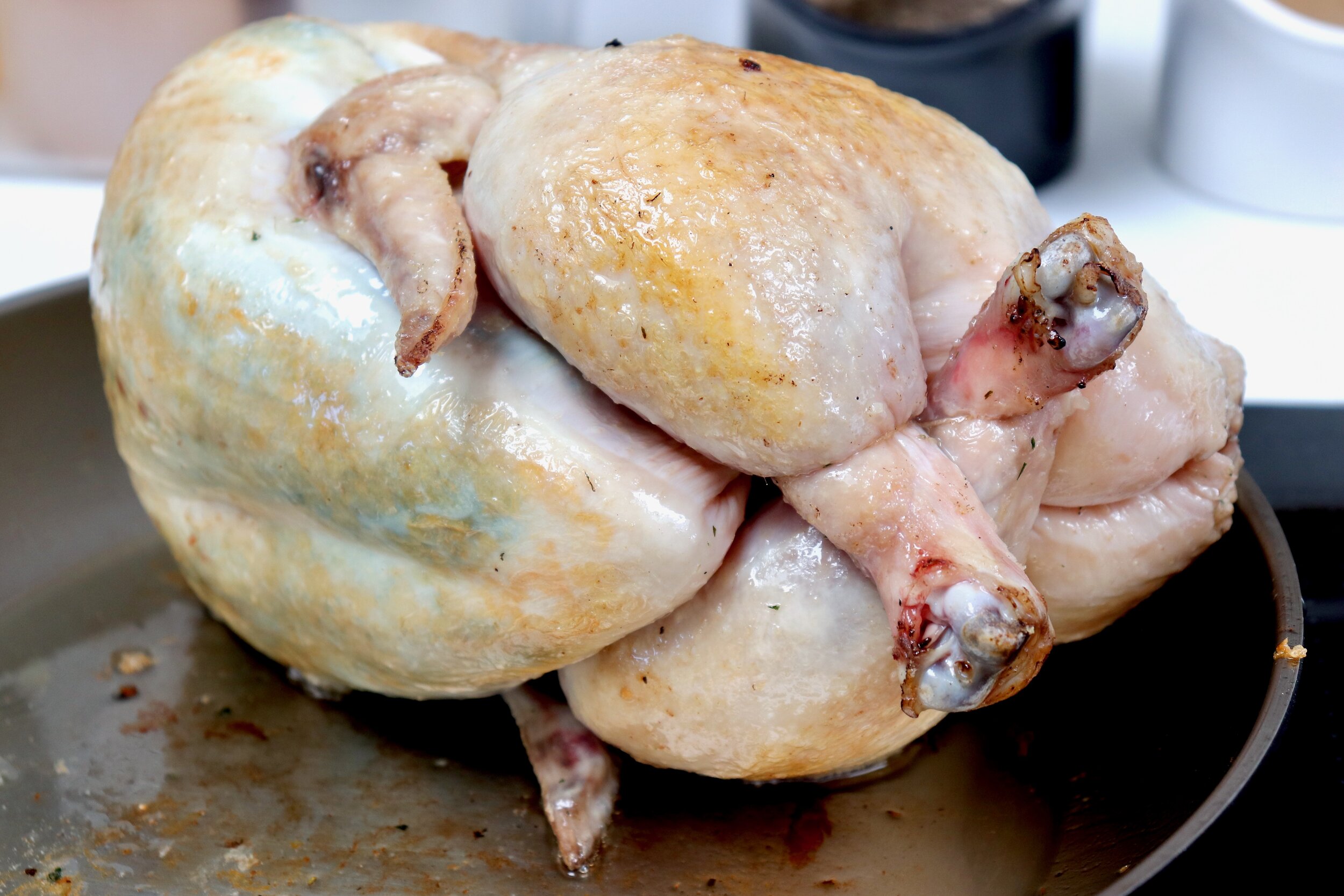 Browning the chicken in a pan