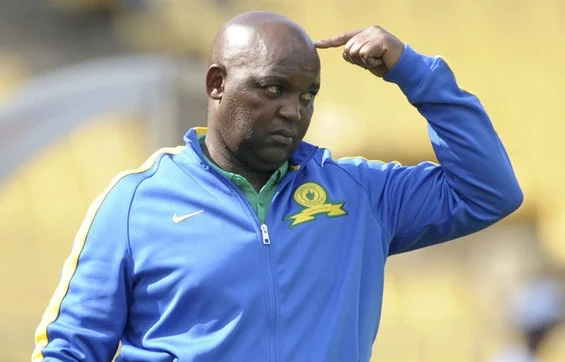 PSL team Mamelodi Sundowns coach Pitso Mosimane talks to his players