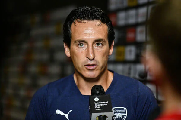 Unai Emery head coach of Arsenal interviews during the International Champions Cup match between Arsenal and Paris Saint Germain at the National Stadium on July 28, 2018 in Singapore. “Thananuwat Srirasant/Getty Images AsiaPac'“