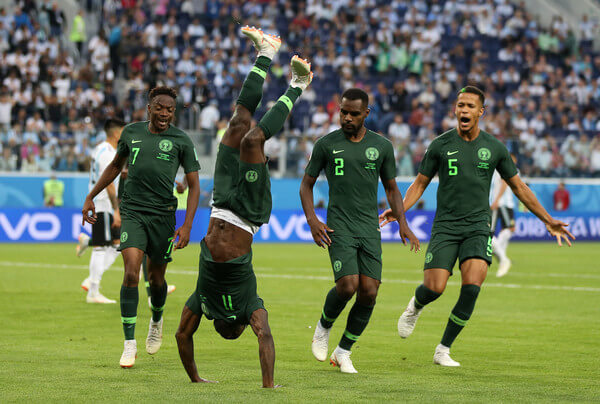 Victor Moses of Nigeria celebrates with teammates after scoring his team's first goal during the 2018 FIFA World Cup Russia group D match between Nigeria and Argentina at Saint Petersburg Stadium on June 26, 2018 in Saint Petersburg, Russia. (June 25, 2018 - Source: Gabriel Rossi/Getty Images Europe)