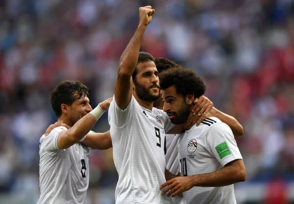 Mohamed Salah of Egypt celebrates with teammate Marwan Mohsen after scoring his team's first goal during the 2018 FIFA World Cup Russia group A match between Saudia Arabia and Egypt at Volgograd Arena on June 25, 2018 in Volgograd, Russia. (June 24, 2018 - Source: Shaun Botterill/Getty Images Europe)