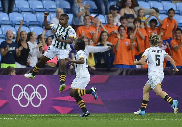 Portia Modise of South Africa celebrates scoring during the Women's Football first round Group F Match of the London 2012 Olympic Games between Sweden and South Africa, at City of Coventry Stadium on July 25, 2012 in Coventry, England. (July 24, 2012 - Source: Sindy Thomas/Getty Images Europe) 