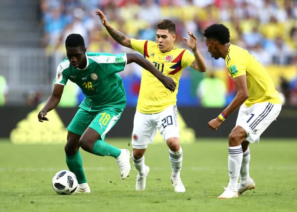 Ismaila Sarr of Senegal and Juan Quintero of Colombia in action during the 2018 FIFA World Cup Russia group H match between Senegal and Colombia at Samara Arena on June 28, 2018 in Samara, Russia. (June 27, 2018 - Source: Maddie Meyer/Getty Images Europe)