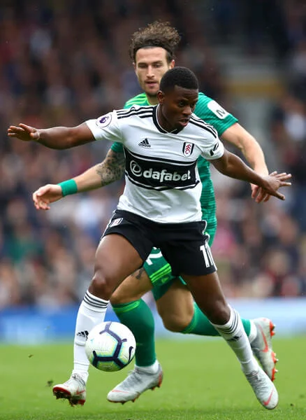 Floyd Ayite of Fulham and Daryl Janmaat of Watford in action during the Premier League match between Fulham FC and Watford FC at Craven Cottage on September 22, 2018 in London, United Kingdom. (Sept. 21, 2018 - Source: Dean Mouhtaropoulos/Getty Images Europe)