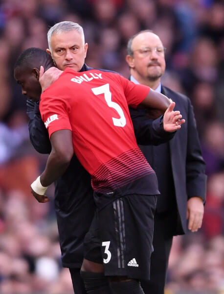 Jose Mourinho, Manager of Manchester United in discussion with Eric Bailly of Manchester United as he is substituted during the Premier League match between Manchester United and Newcastle United at Old Trafford on October 6, 2018 in Manchester, United Kingdom. (Oct. 5, 2018 - Source: Laurence Griffiths/Getty Images Europe)