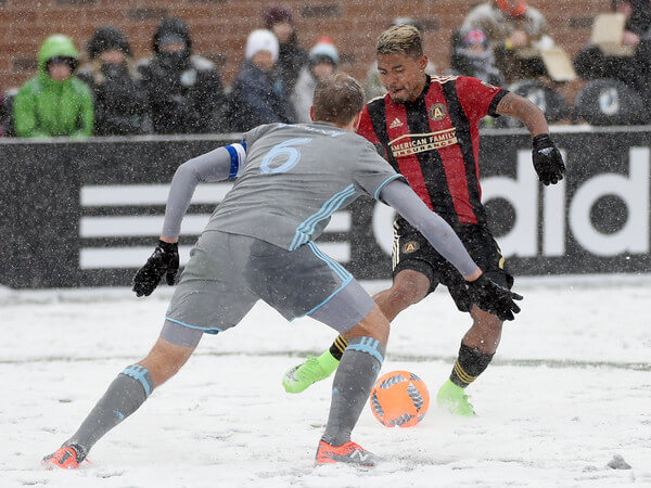 Josef Martinez #7 of Atlanta United FC controls the ball against Vladim Demidov #6 of Minnesota United FC during the second half of the match on March 12, 2017 at TCF Bank Stadium in Minneapolis, Minnesota. Atlanta defeated Minnesota 6-1. (March 11, 2017 - Source: Hannah Foslien/Getty Images North America)