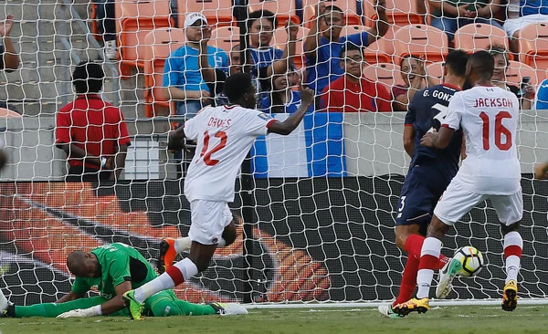 Patrick Pemberton #18 of Costa Rica is beaten by Alphonso Davies #12 of Canada for a goal in the in the first half at BBVA Compass Stadium on July 11, 2017 in Houston, Texas. (July 10, 2017 - Source: Bob Levey/Getty Images North America)