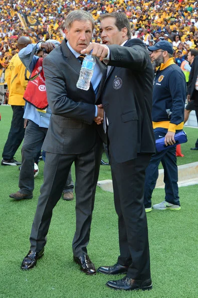 Head coach Staurt Baxter of Kaizer Chiefs and head coach Roger De Sa (R) Orlando Pirates during the Absa Premiership match between Orlando Pirates and Kaizer Chiefs at FNB Stadium on October 26, 2013 in Soweto, South Africa. (Oct. 25, 2013 - Source: Gallo Images/Getty Images Europe)
