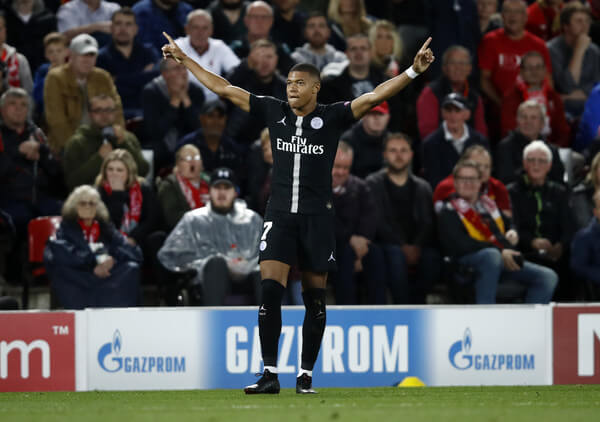 Kylian Mbappe of Paris Saint-Germain celebrates after scoring his team's second goal during the Group C match of the UEFA Champions League between Liverpool and Paris Saint-Germain at Anfield on September 18, 2018 in Liverpool, United Kingdom. (Sept. 17, 2018 - Source: Julian Finney/Getty Images Europe)