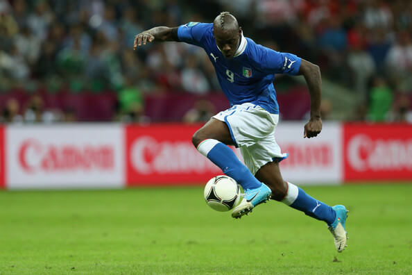Mario Balotelli of Italy controls the ball as he runs through to score his team's second goal during the UEFA EURO 2012 semi final match between Germany and Italy at the National Stadium on June 28, 2012 in Warsaw, Poland. (June 27, 2012 - Source: Joern Pollex/Getty Images Europe)