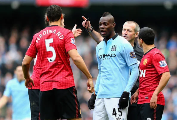 Rio Ferdinand of Manchester United and Mario Balotelli of Manchester City have words during the Barclays Premier League match between Manchester City and Manchester United at the Etihad Stadium on December 9, 2012 in Manchester, England. (Dec. 8, 2012 - Source: Clive Mason/Getty Images Europe)